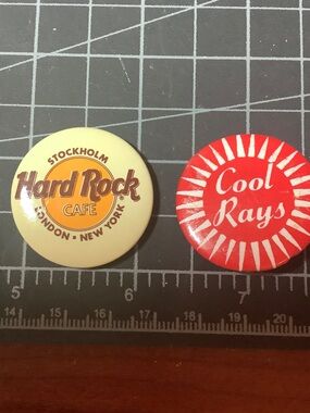 Hard Rock Cafe beige and orange logo pin and Cool Rays pin.